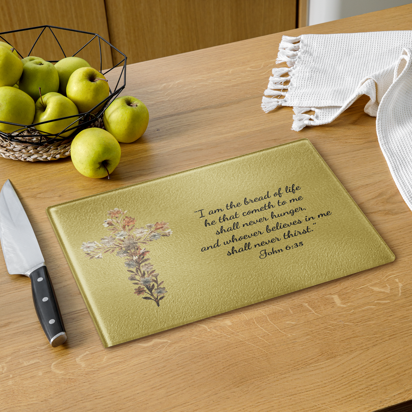 Premium Glass Cutting Board featuring a delicate floral cross and the inspirational quote that our Lord is the Bread of Life