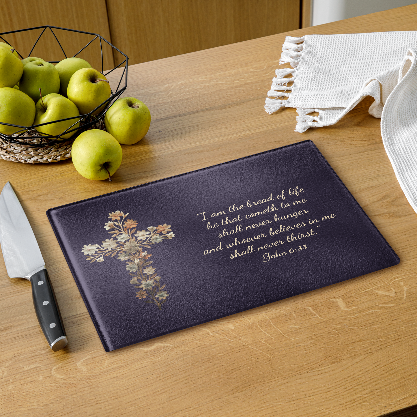 Premium Glass Cutting Board featuring a delicate floral cross and the inspirational quote that our Lord is the Bread of Life
