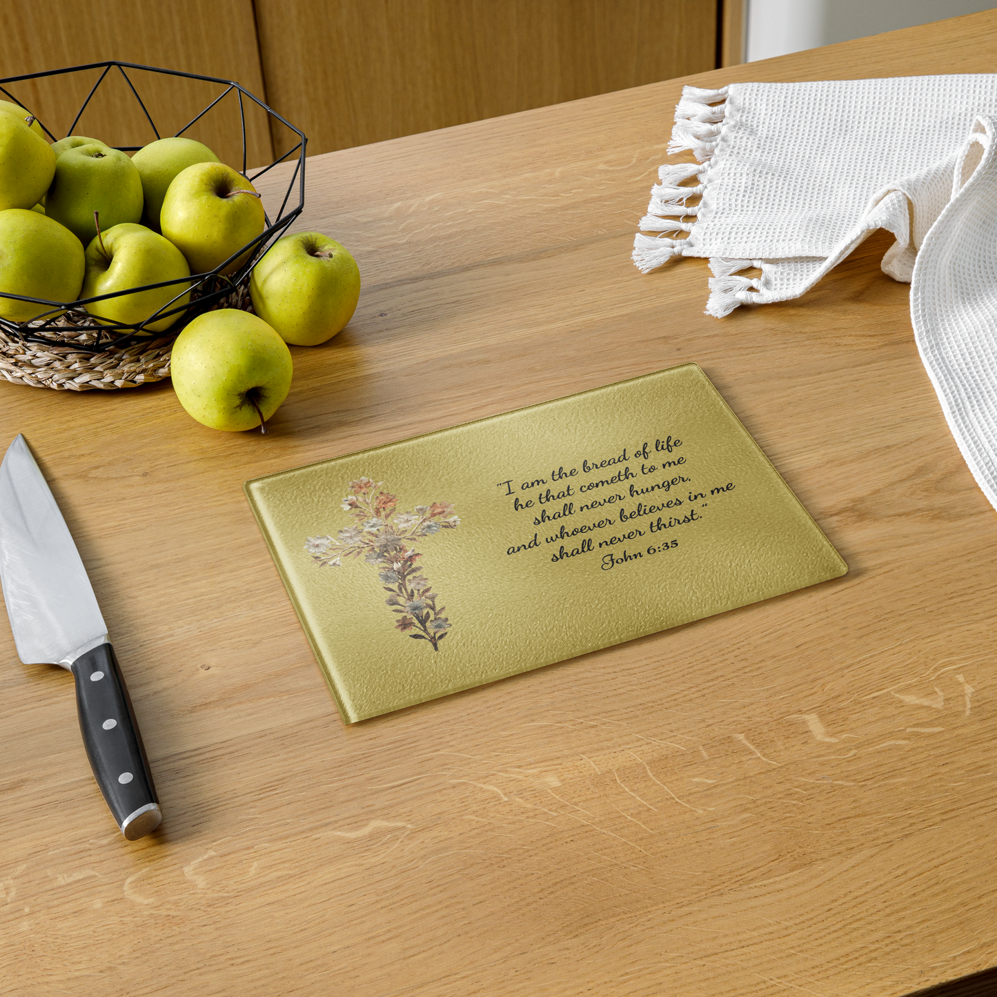 Premium Glass Cutting Board featuring a delicate floral cross and the inspirational quote that our Lord is the Bread of Life