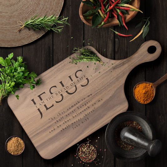 Hardwood_paddle_cutting_board_engraved_w_Dark_Handle_V_Lifestyle_Mockup.png