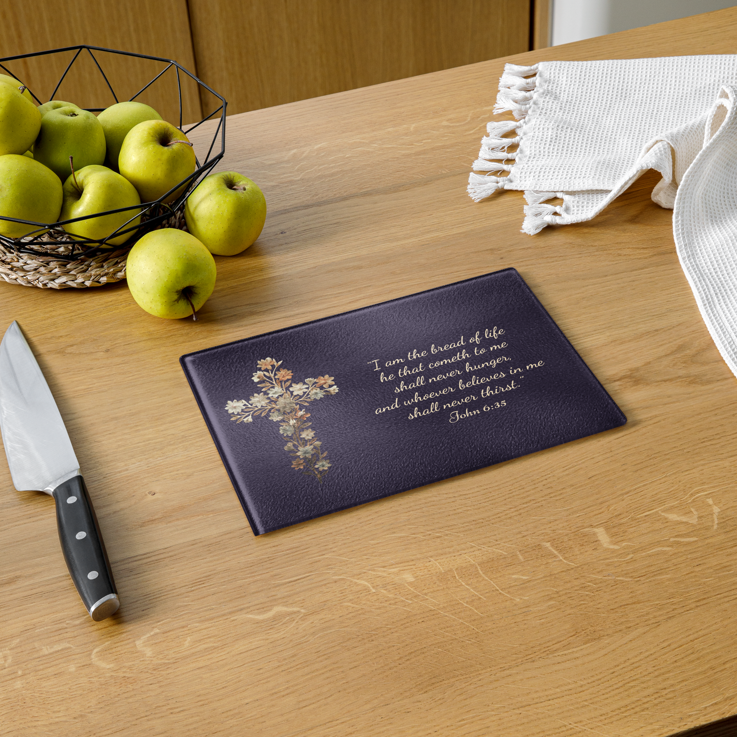 Premium Glass Cutting Board featuring a delicate floral cross and the inspirational quote that our Lord is the Bread of Life