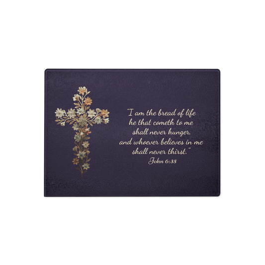 Premium Glass Cutting Board featuring a delicate floral cross and the inspirational quote that our Lord is the Bread of Life